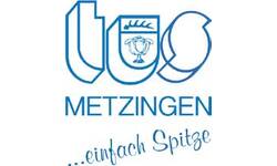 Das Logo von TuS Metzingen zeigt den Vereinsnamen in blauer Schrift mit einem stilisierten Stadt- und Wappenelement.